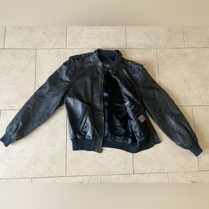 Members Only black leather jacket. Size 40.